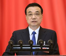 政府工作报告暖侨心......